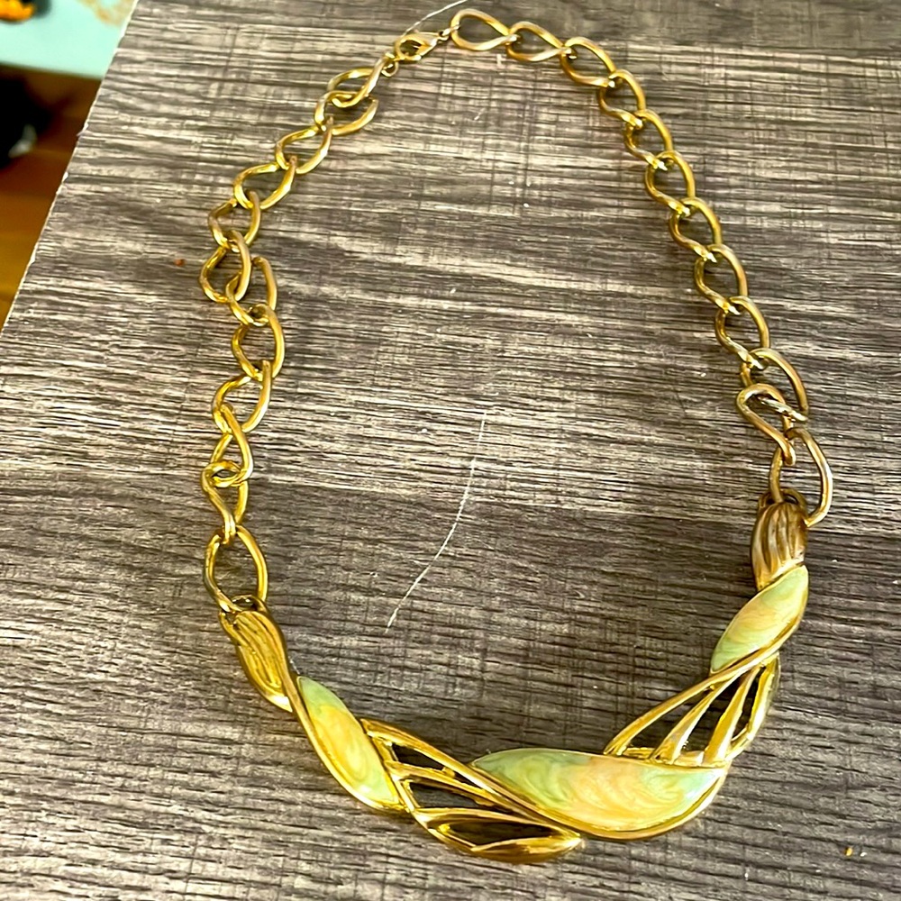 Vintage gold tone with muted enamel leaves Trifari necklace .